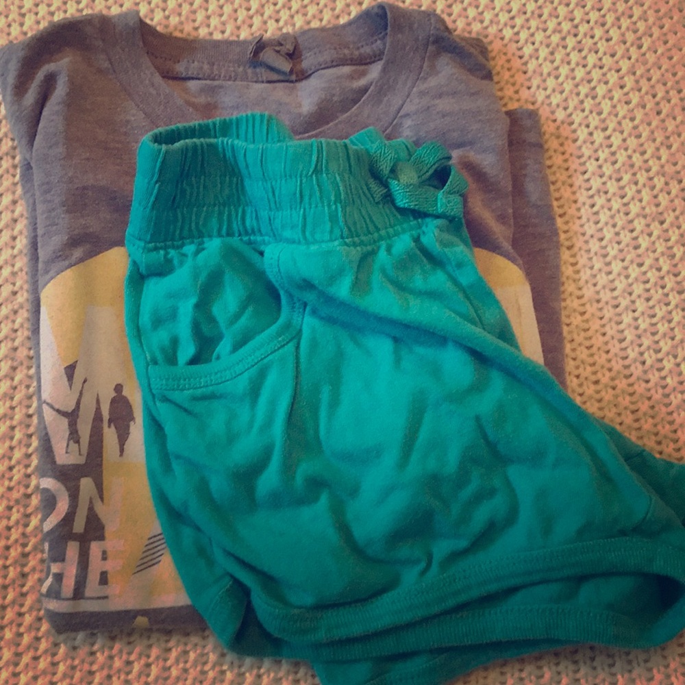 Mebane on the move shirt and teal shorts